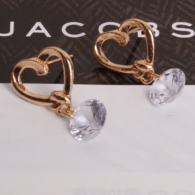 2 pendientes elegantes con diseño de corazón de cristal para mujer.