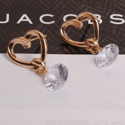 2 pendientes elegantes con diseño de corazón de cristal para mujer.