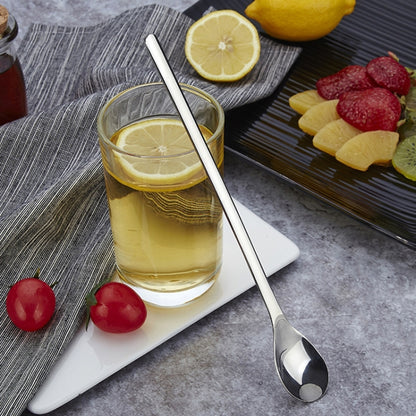 Colher em aço inoxidável com cabo longo para mexer café e gelado.